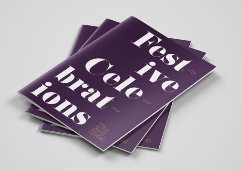 3 purple booklets with white text 'Festive celebrations' are stacked in a pile