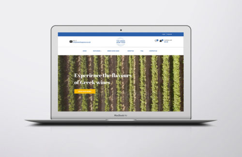 Macbook screen featuring the home page for the Greek Wine shop